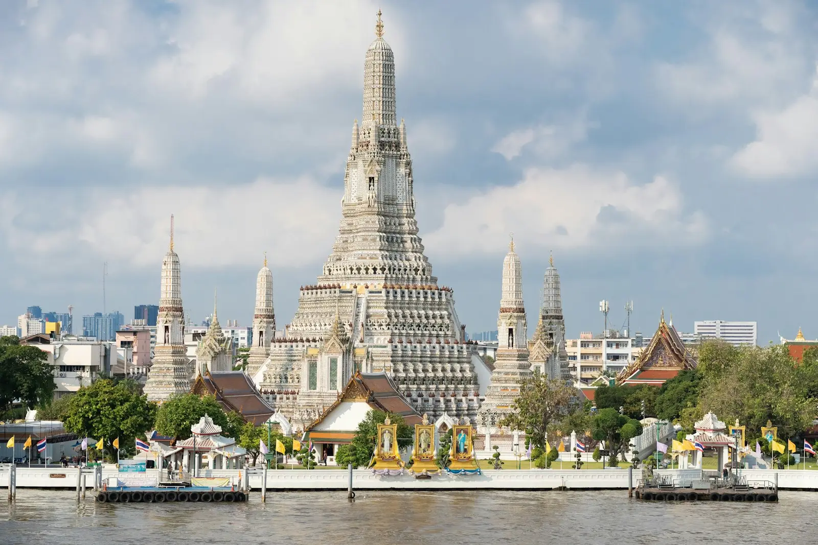Wat Arun’s central tower beside the Chao Phraya River in Bangkok